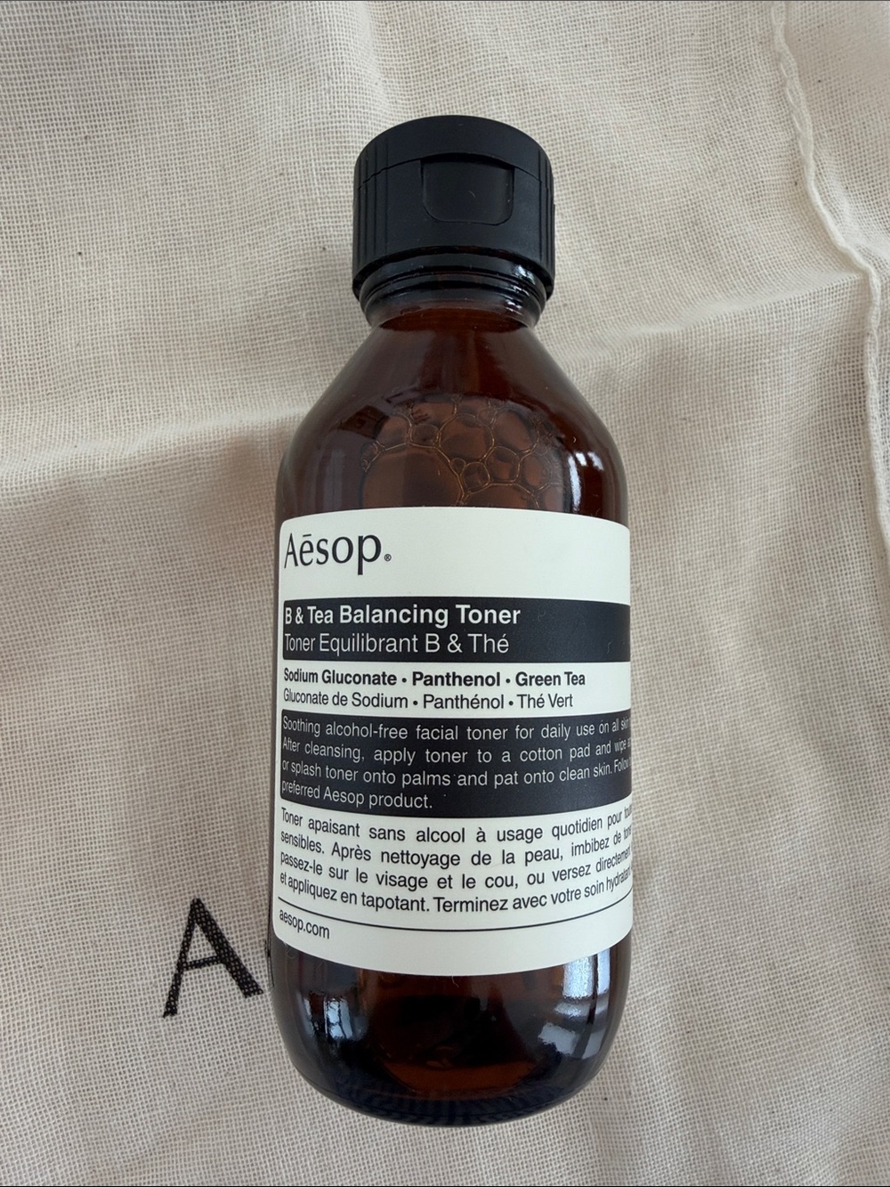 Aēsop Unisex Skincare Travel Kit – Black Case with Cream & Amber Bottles - Picture 8 of 9